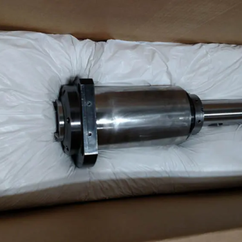 A newly repaired spindle in a box ready to be shipped