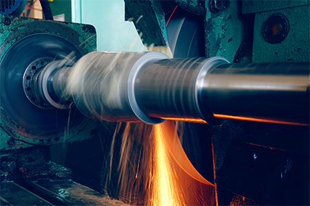 Machining of the internal hole on a coordinate grinding machine with sparks, in an industrial plant.